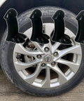 Glow In The Dark Prank Tire Valve Stem Caps 4 Pack Dust Proof Covers displayed on a car wheel for SUVs and motorcycles.