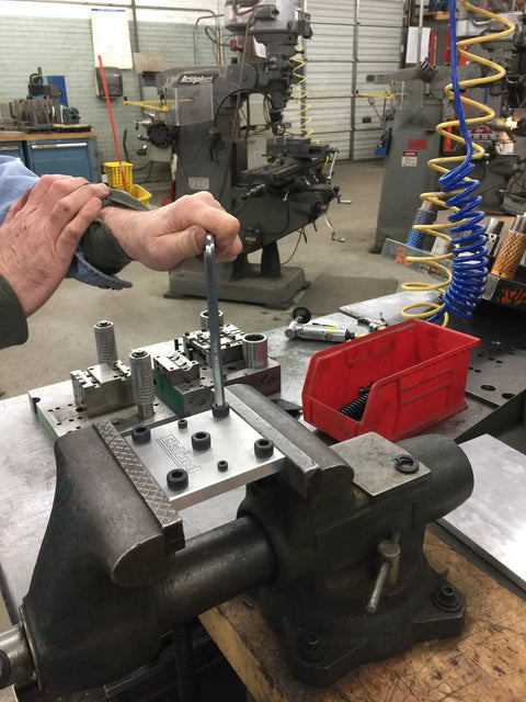 17 Millimeter Short Series Hex Key Allen Wrench with long arm in use on a metalwork project in a workshop setting.