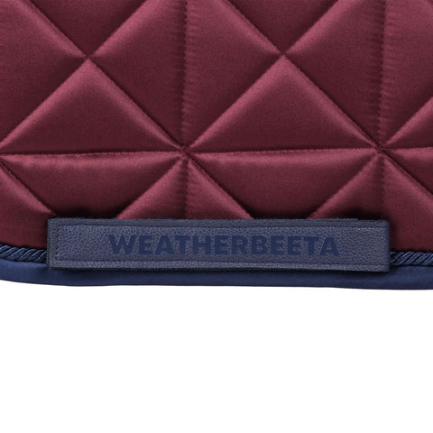 Close-up of burgundy Premium Satin Luxe Air Tec Quilted Dressage Saddle Pad with Breathable Mesh Spine Large