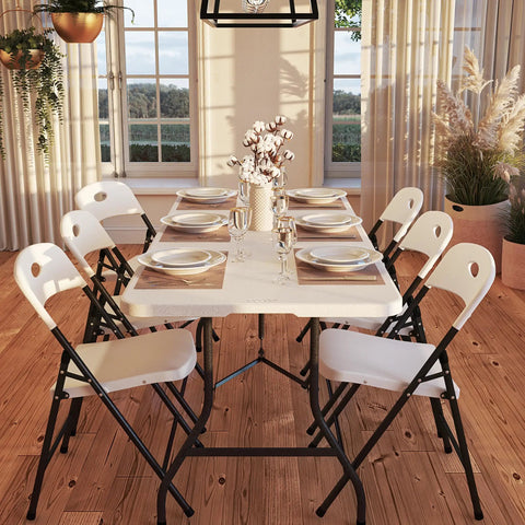 Dining setup on Six Foot Fold In Half Blow Molded Folding Table For Indoor And Outdoor Use With Comfort Handle Lightweight Plastic Top