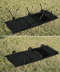 Super Sturdy Height Adjustable Camping Cot With Leg Extenders Holds Up To 330 Pounds folded on grass.