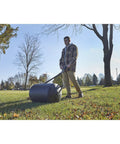 Man using Lawn Roller 18 Inch Diameter 24 Inch Wide Poly Drum Holds Up To 270 Lbs And 31.1 Inch Working Width For Versatile Push And Tow