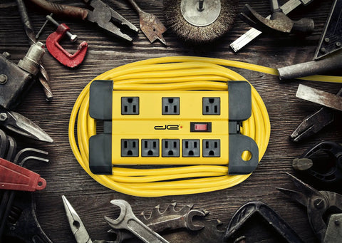 Heavy Duty 8 Outlet Surge Protector Power Strip With 25 Foot Cord And Metal Mountable Design 1050 Joules shown with tools