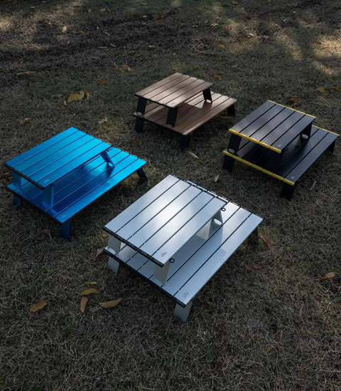 Ultralight Compact Mini Beach Picnic Folding Aluminum Table With Carry Bag Nature Finish in various colors on grass