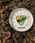 Worm Bin Soil Thermometer with 5-inch stainless steel stem in compost, showing color-coded gauge for easy read temperature 55-90°F