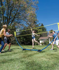 People playing with Backyard Badminton Set With Easy Setup Net 4 Steel Shaft Rackets 2 Durable Shuttlecocks 15 Feet Wide And 5 Feet Tall Court