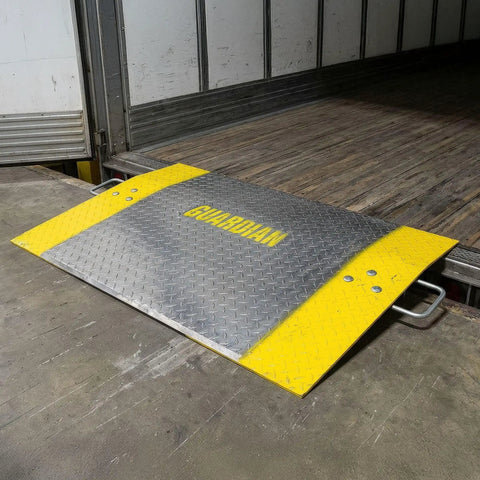 Beefy Aluminum Dock Plate 48 x 60 For Pallet Jacks And Hand Carts, 2900 Lb Capacity on loading dock with yellow curbs