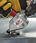 Turbo Sheet Metal Shear Attachment For Drills cutting metal with cordless drill, featuring lightweight aluminum head and 20 gauge capacity.