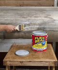 Person applying Liquid Rubber Coating Sealant For Waterproof, Flexible, UV Resistant Protection, Brush Roll Or Pour Application for Roofs
