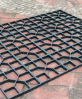 2 Pack Outdoor Pavement Molds For DIY Cement Stepping Stones Walkway Maker displayed on brick surface