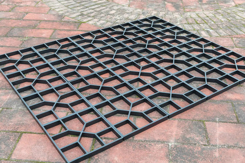 2 Pack Outdoor Pavement Molds For DIY Cement Stepping Stones Walkway Maker displayed on brick surface