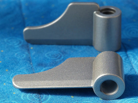 8-BBP-P070 Paddle Blade Replacement Pack Of 2 For BB-PAC20 Bread Machine Kneading Blades in gray on blue fabric