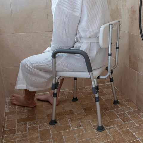 Hercules Series Adjustable Navy Bath And Shower Chair, 300 Pound Capacity, Quick Release Back And Arms in a shower setting