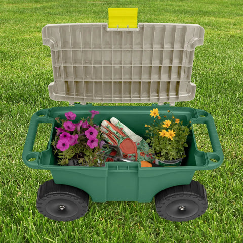 Open view of a green plastic garden bench on wheels revealing built-in storage with gardening tools and plants inside. Rolling Garden Cart With Seat And Interior Tool Tray Green Plastic Garden Bench On Wheels For Easier Weeding Planting And Light Transport Includes Built In Storage For Tools And Supplies No More Crawling Or Kneeling.