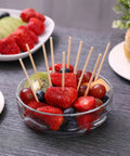 Glass bowl with fruit skewered on Bamboo Skewers 6 Inch 200 Pack For Appetizers, Fruit Kabobs, Grilling Kebabs, Cocktail Picks