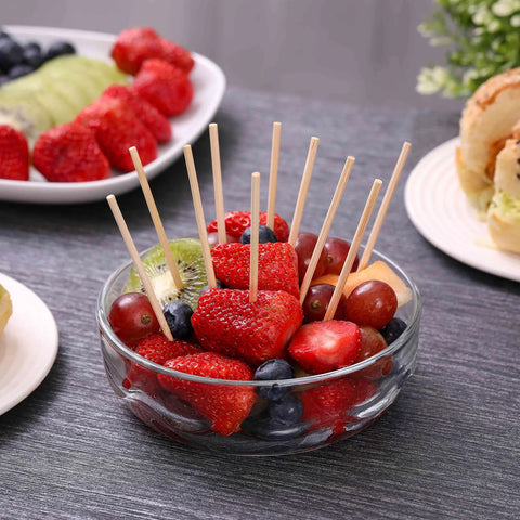 Glass bowl with fruit skewered on Bamboo Skewers 6 Inch 200 Pack For Appetizers, Fruit Kabobs, Grilling Kebabs, Cocktail Picks