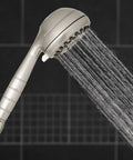 High Pressure Powerpulse Massage Handheld Shower Head With 7 Spray Settings And 5 Foot Hose Brushed Nickel Detachable Shower Head Delivers 2X Massage Power For Quick Relieving Showers, water flow visible.