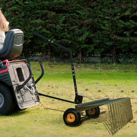 Side view of 60 Inch Tow Behind Lawn Dethatcher With 24 Spring Steel Tines, Heavy Duty Pine Needle And Pine Straw Rake For ATV UTV And Garden Tractors, Easy All In One Yard Cleanup Orange