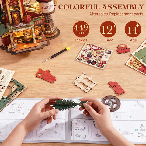 Hands assembling the 3D Puzzle For Adults Dope Dream Factory Gift Kit Luminous Wooden Model DIY Dollhouse Scene with parts and instructions.