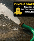 WAYNE WaterBUG 1/6 HP submersible pump with green hose attached, spraying water on a wet pavement.