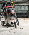 16-Gallon Stainless Steel Wet Dry Shop Vacuum With Cart, Pro Hose, Drain And Blower Port, 6.5 Peak HP Motor on concrete floor