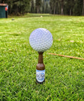 Beer Bottle Golf Tees Pack Of 6 For Golfers on green, virtually unbreakable recyclable plastic 3-1/4 inch tall
