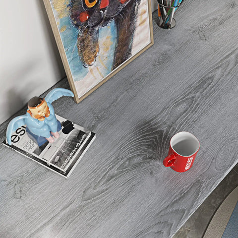 Gray Wood Grain Contact Paper 24x200 Self Adhesive Peel And Stick For Cabinets on desk with decor and red mug.
