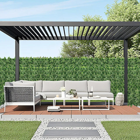 Modern patio with pergola and couch in front of Watermelon Leaves Faux Ivy Privacy Fence Screen For Indoor Outdoor Use, UV Resistant, Realistic Fake Ivy Wall Hedges, 118 Inches Long By 39.4 Inches Wide, Breaks Down Into 12 Panels, Cut To Fit, Ideal Backyard Vibe Backdrop.