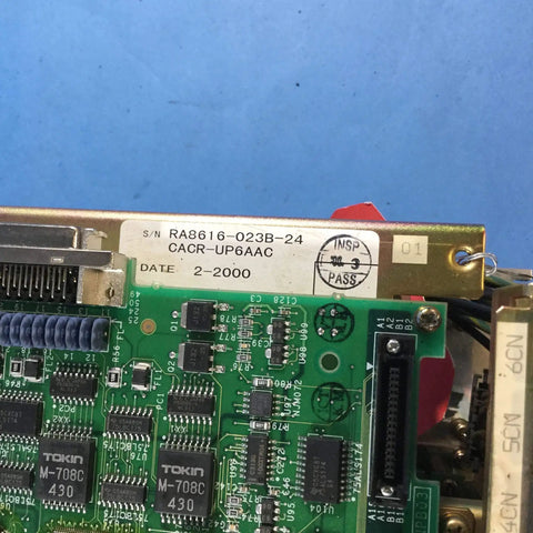 CACR UP6AAC Servo Drive Unit Ready To Roll, Industrial Grade Motion Controller For Servo Motors, Used But Tested, CNC Automation And Robotics Component, High Performance Drive Module For Automation Systems. close-up PCB label