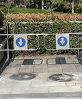 Premium Heavy Duty Self Closing Security Gate Featuring Slick One Way Swing Action For Bustling Warehouses And Supermarket Aisles With Zero Hassle Pedestrian Flow Control, stainless steel frame with directional signage.