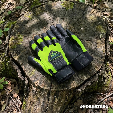 Hi-Vis Chainsaw Gloves With Anti-Vibration Padding And Cut-Resistant Kevlar Leather For Tree Cutting on a tree stump