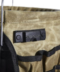 Close-up of Waxed Canvas Tool Bucket Organizer for a 5 Gallon Bucket, showing heavy-duty build with 58 pockets.