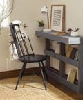 Fast Drying Oil Based Polyurethane Wood Finish In Warm Satin Tone offering protection to a black chair and console table in a cozy room.