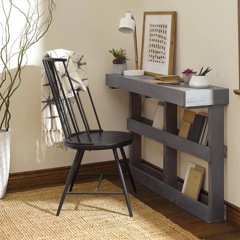 Fast Drying Oil Based Polyurethane Wood Finish In Warm Satin Tone offering protection to a black chair and console table in a cozy room.