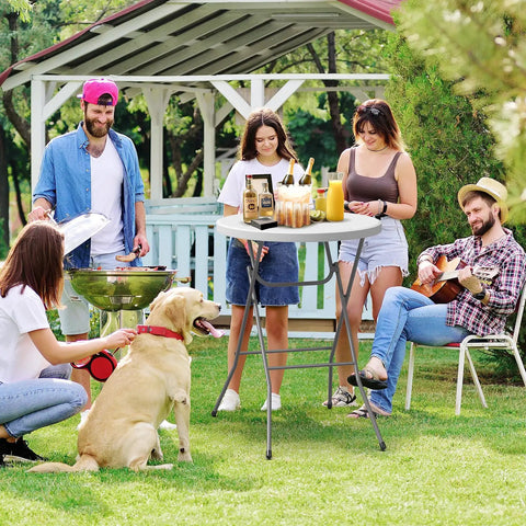 Group enjoying outdoor party with 32 Inch Plastic Folding Round Bar Height Table With Gray Metal Finish and drinks
