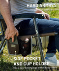 Foldable Padded Rocking Chair With A 29 Inch High Back For Outdoor Chill Sessions Easy Stand Up Heavy Duty And Portable For Camping Patio Lawn Garden Or Balcony Supports 300 Lbs Brown, showing a side pocket and cup holder.