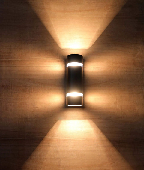Outdoor Wall Light Sconce 2 Pack Black Waterproof D Shaped Mount Modern Dope Exterior Lighting For Garden And Patio Up And Down Frosted Glass Aluminum Alloy Finish Weatherproof Durable, illuminated against a wooden background showcasing up and down lighting effect.
