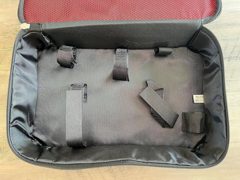 Interior of Pro-Grade Tool Bag For Pros In Red And Black, Heavy Duty Carry Case For M12 System Tools showing straps and pockets