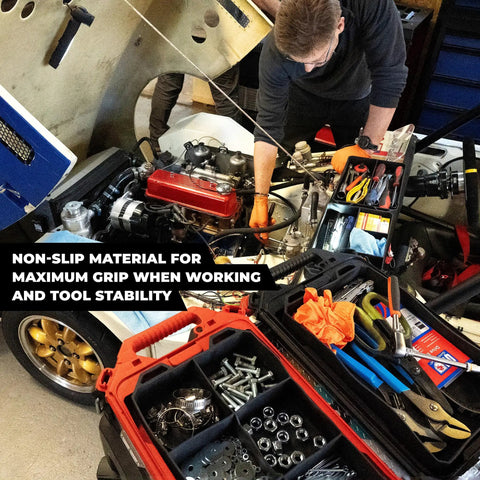 Man using Quad FlexiTray Flexible Tool Tray System For Milwaukee PACKOUT Compatible Organizer, non-slip grip, in workshop.