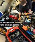 Six FlexiTray Flexible Tool Trays Milwaukee PACKOUT Compatible organizing tools and parts in garage workshop setting.