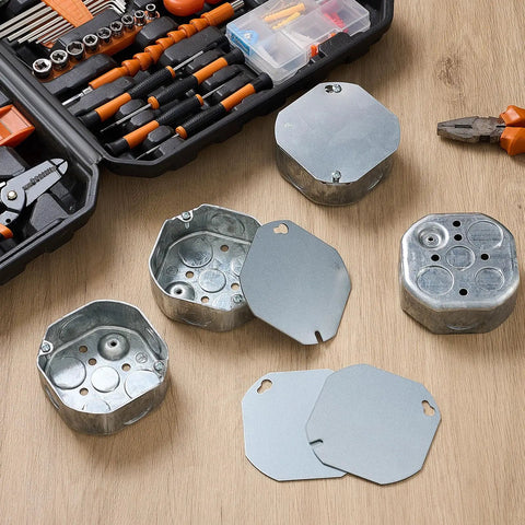 Four Pack Four By Four Inch Electrical Junction Boxes With Covers Octagonal Metal Outlet Boxes 15.5 Cu In Capacity One And One Half Inch Deep Receptacle Exposed Work Box Set For DIY Renovations on workbench