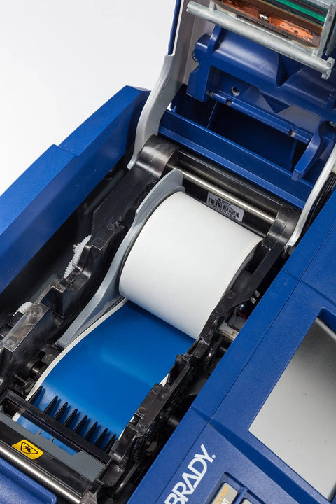 Details of the Straight Up Heavy Duty Desktop And Portable Label Printer With Quick Charge USB showing label roll and internal mechanisms.