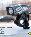Lumina Micro 850 Front Bike Light USB Rechargeable LED Water Resistant mounted on bike handlebar