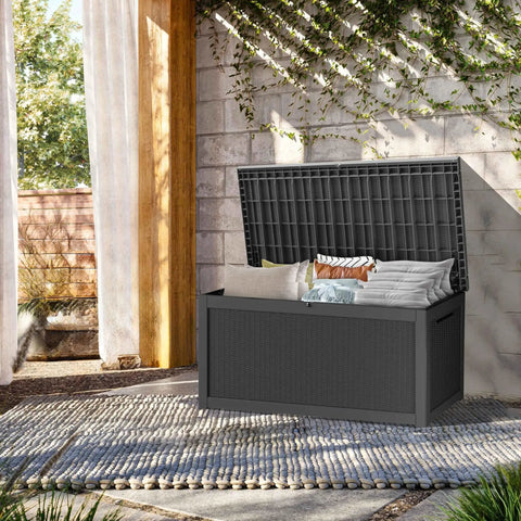 320 Gallon Lockable Resin Deck Box Waterproof And UV Resistant Outdoor Storage Box For Cushions Garden Tools And Pool Accessories Beefy Heavy Duty Weatherproof Black on patio with lid open showing stored cushions.