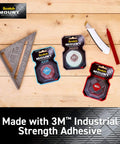 Three types of Scotch Mount double-sided tape with 3M industrial strength adhesive on a wooden surface next to a cutting tool and pencil.