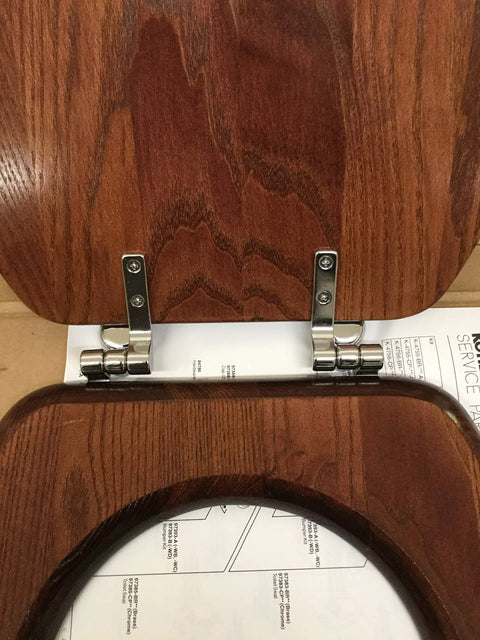 Solid Oak Elongated Toilet Seat with Cover and Polished Chrome Hinges for Vintage Bathrooms close-up of chrome hinges and mahogany finish