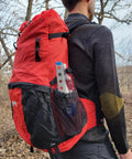 Ultralight Backpacking Trowel 0.48 Oz 13.5 G Blue With Lifetime Warranty in mesh pocket on red hiking backpack.