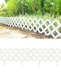 Garden Edging Border Kit 10 Pack 23x8.5 Inch White Plastic Fence Panels installed along pathway and flower bed