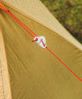 Paracord 175 Lightweight Visible Guyline For Tents And Tarps Reflective Orange 100 Ft Camping Cord installed with tent