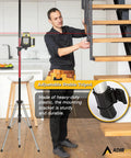 Pro Grade Laser Level Pole Kit With Tripod And Mount For Rotary And Line Lasers set up in a home setting next to a staircase.